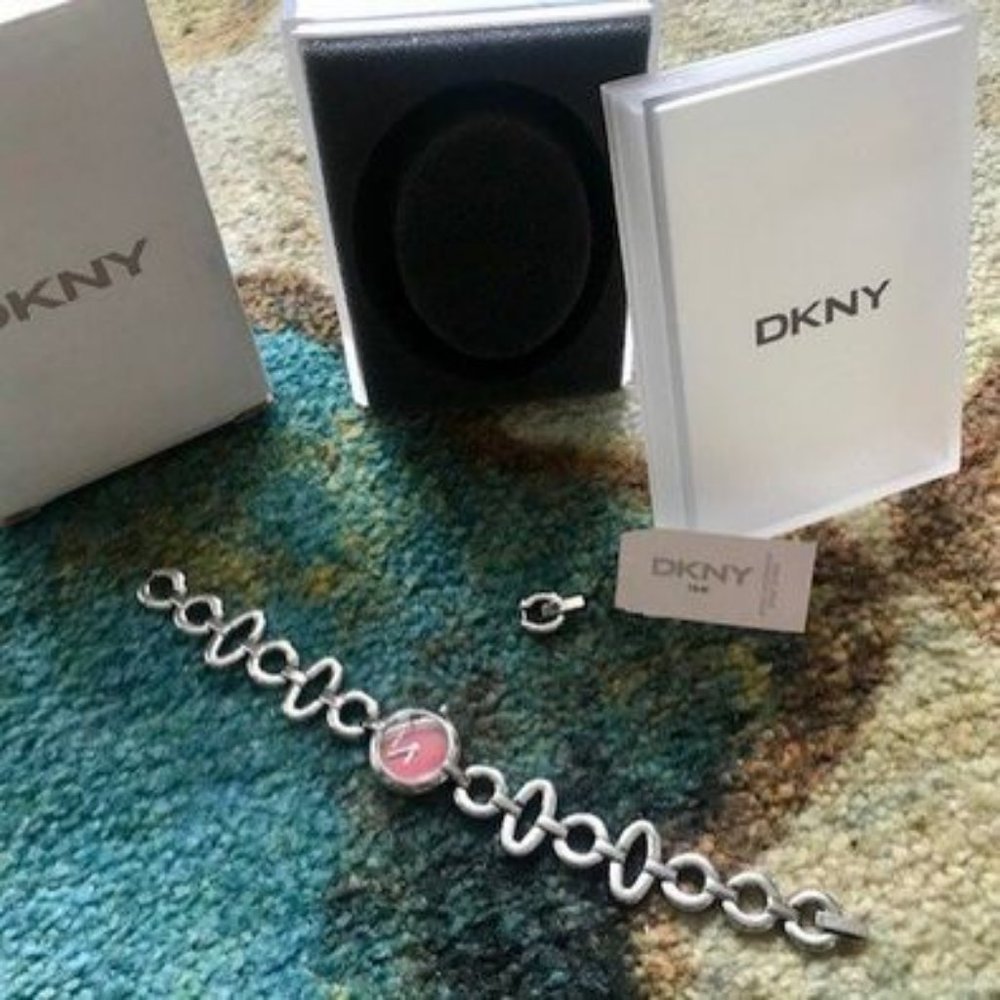 DKNY stainless steel watch with candy apple red face